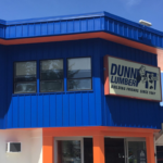 Exterior painting of commercial dunn lumber building