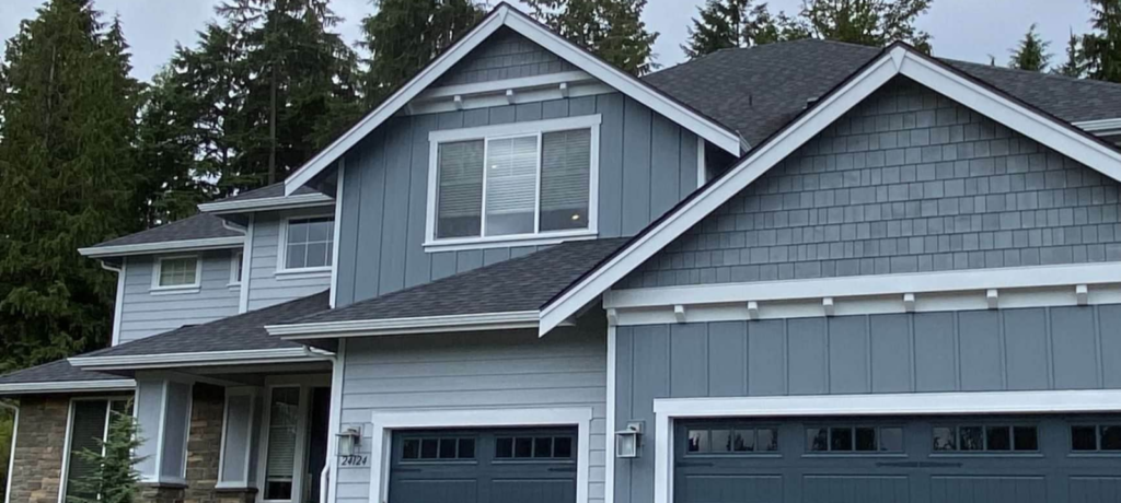 Exterior house painting in Seattle home with fresh paint finish